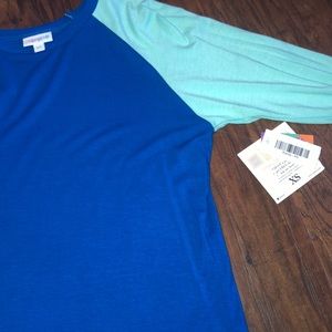 A blue and mint green LuLaRoe long sleeve